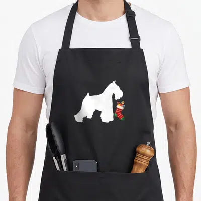 Miniature womens christmas aprons - White dog silhouette holding red and green stocking filled with gifts — shown on a black cotton canvas apron against a white background