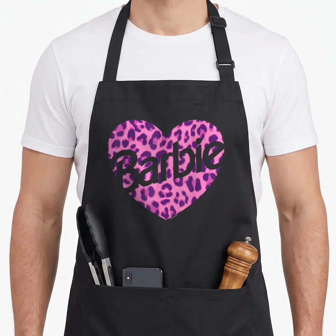 Funny leopard apron - Pink leopard heart with grey Barbie text overlay — shown on a black cotton canvas apron against a white background