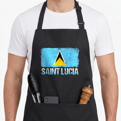 Saint st apron - Distressed Saint Lucia flag and text on black bib apron — shown on a black cotton canvas apron against a white background