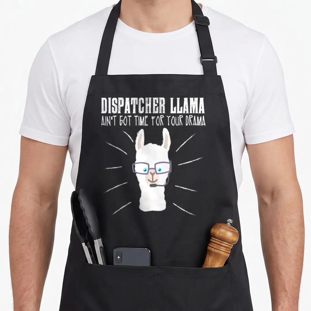 Llama future dispatcher apron - Cartoon llama with purple glasses and headset under text DISPATCHER LLAMA AIN'T GOT — shown on a black cotton canvas apron against a white background