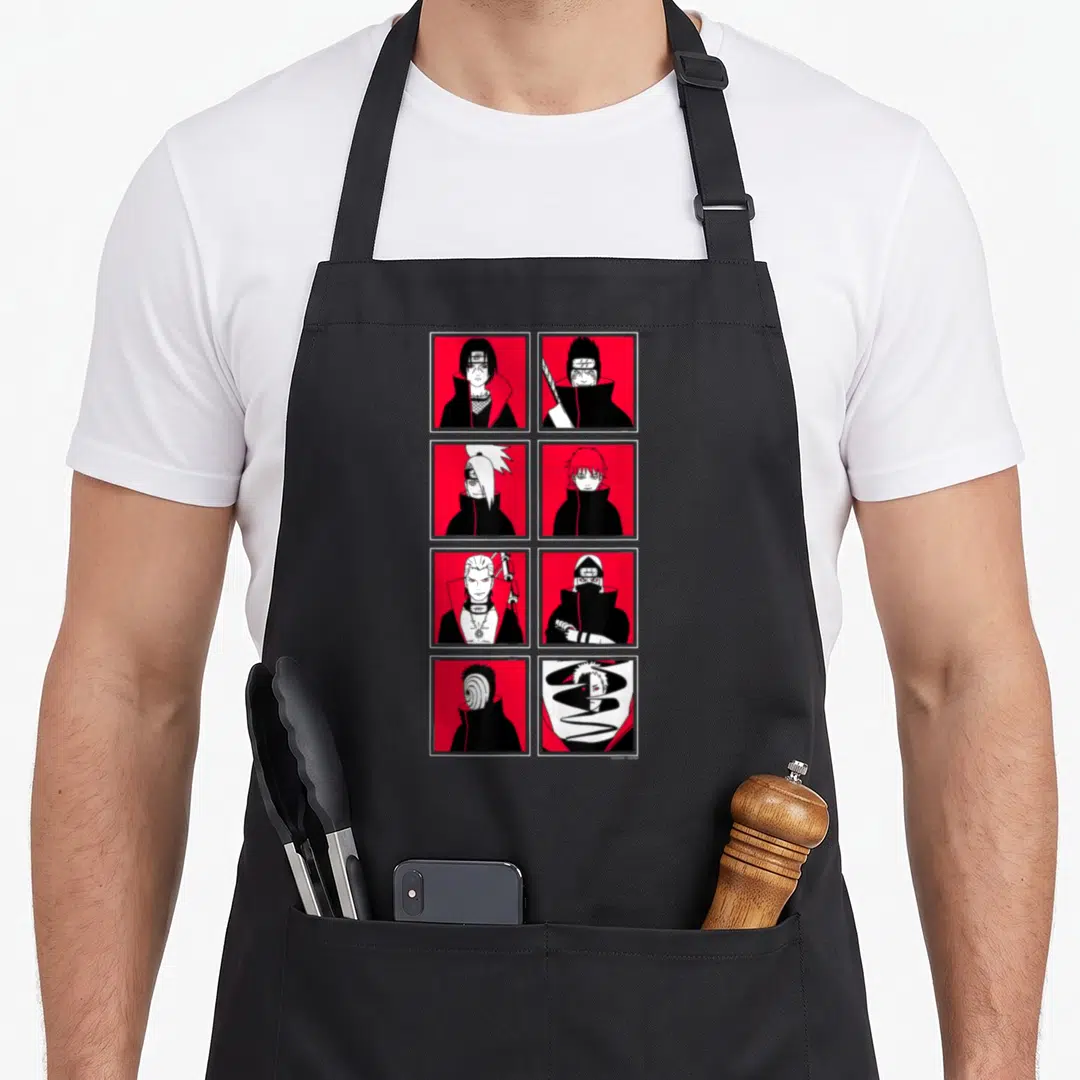 Akatsuki anime character apron - Eight character portraits in white frames on red backgrounds with black line art — shown on a black cotton canvas apron against a white background