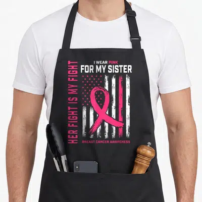 Fight cancer girl apron - Pink ribbon over distressed flag with I wear pink for my sister text — shown on a black cotton canvas apron against a white background