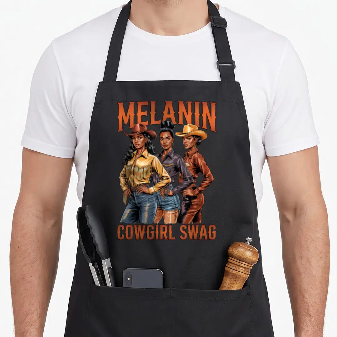 History western apron - Three cowgirls in orange, brown, blue, yellow with MELANIN COWGIRL SWAG text — shown on a black cotton canvas apron against a white background
