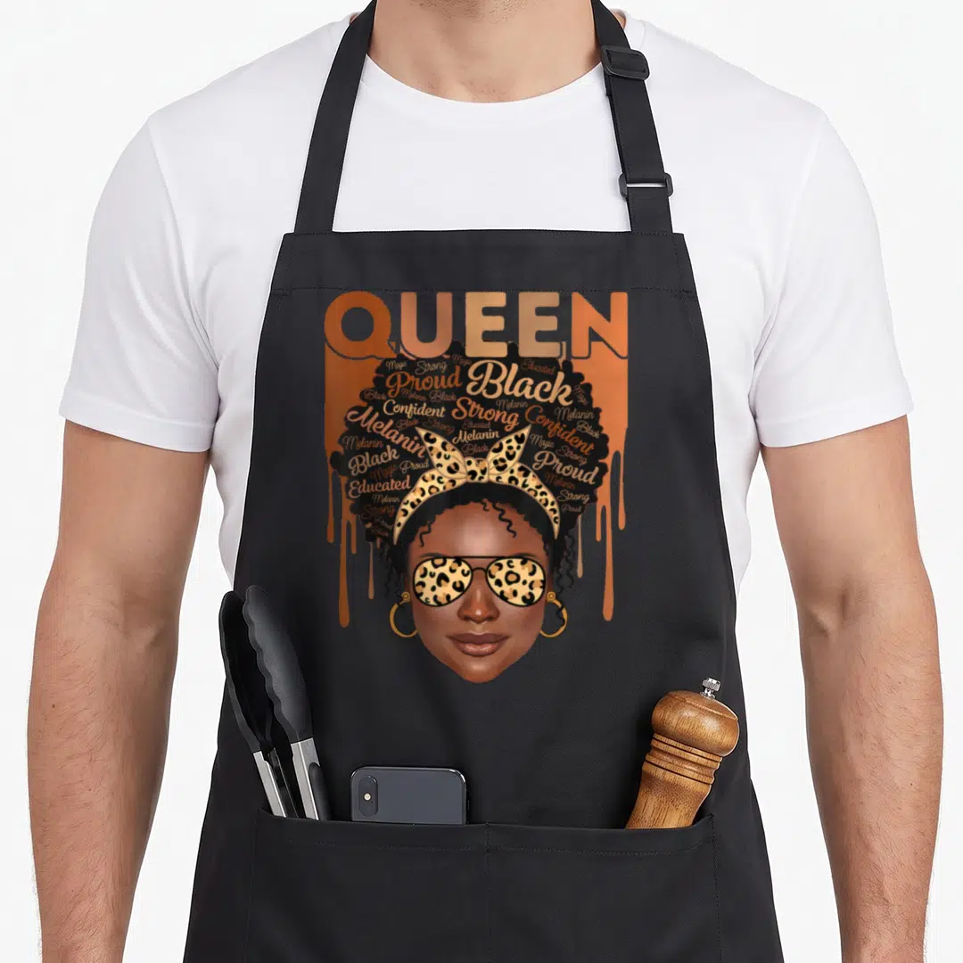 Educated strong african american aprons - Woman with afro filled with Black Melanin Strong Proud words, leopard — shown on a black cotton canvas apron against a white background