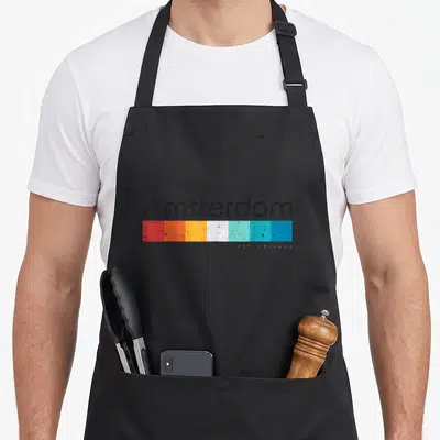 Vintage amsterdam netherlands apron - Amsterdam text above six red orange yellow white and blue rectangles — shown on a black cotton canvas apron against a white background