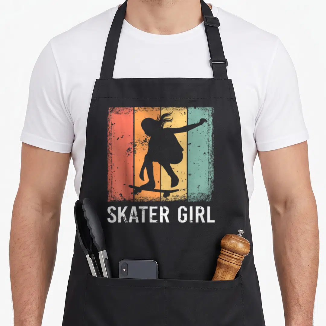 Skating best skater skateboarder accessories stuff apron - Grey girl silhouette on skateboard over vertical red orange — shown on a black cotton canvas apron against a white background