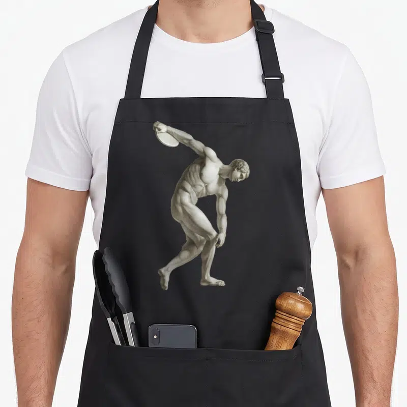 Discobolus throwers apron - Grey realistic drawing of a muscular man throwing a disc in a dynamic pose — shown on a black cotton canvas apron against a white background