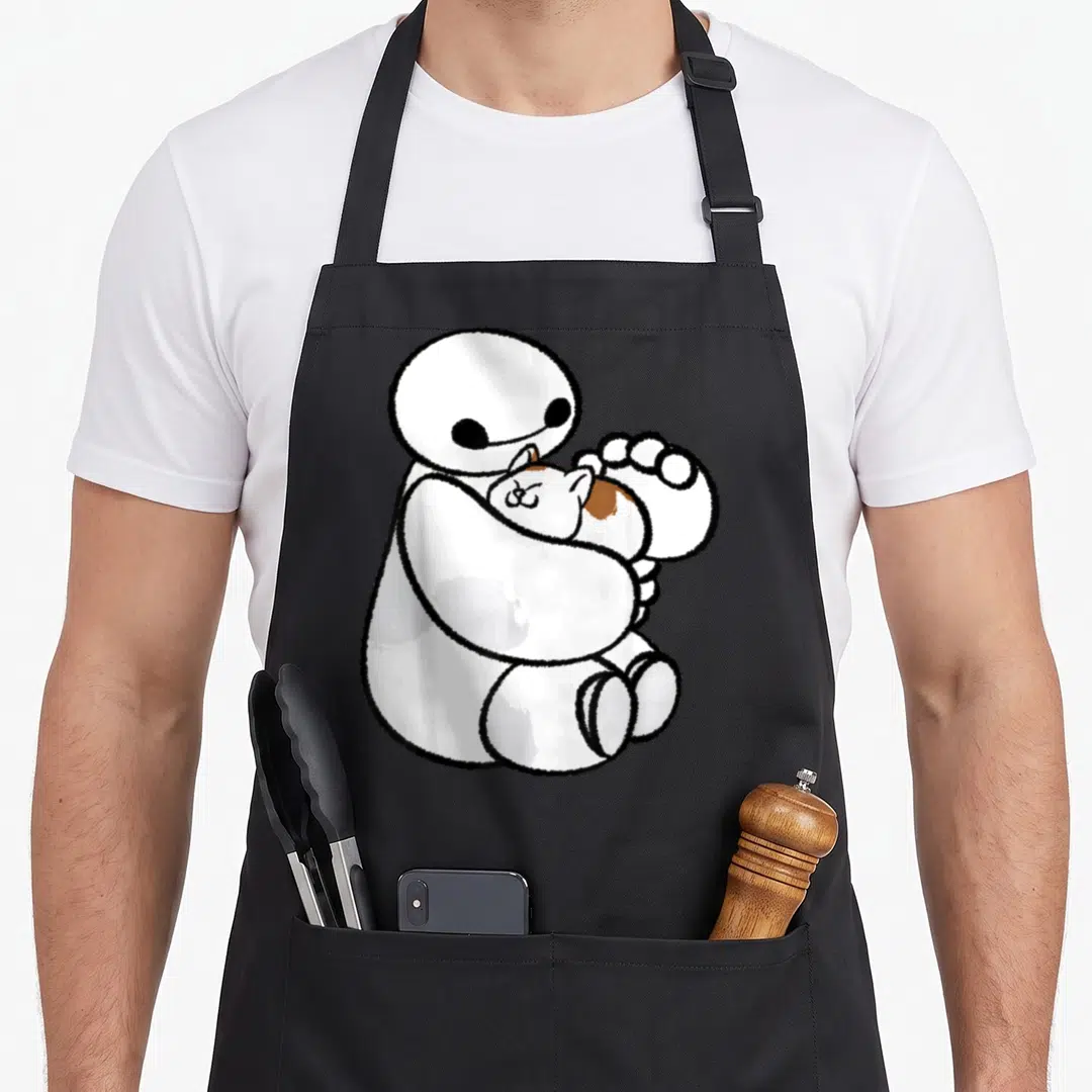 Hero cat apron - White cartoon figure sitting and hugging a small brown and white cat — shown on a black cotton canvas apron against a white background