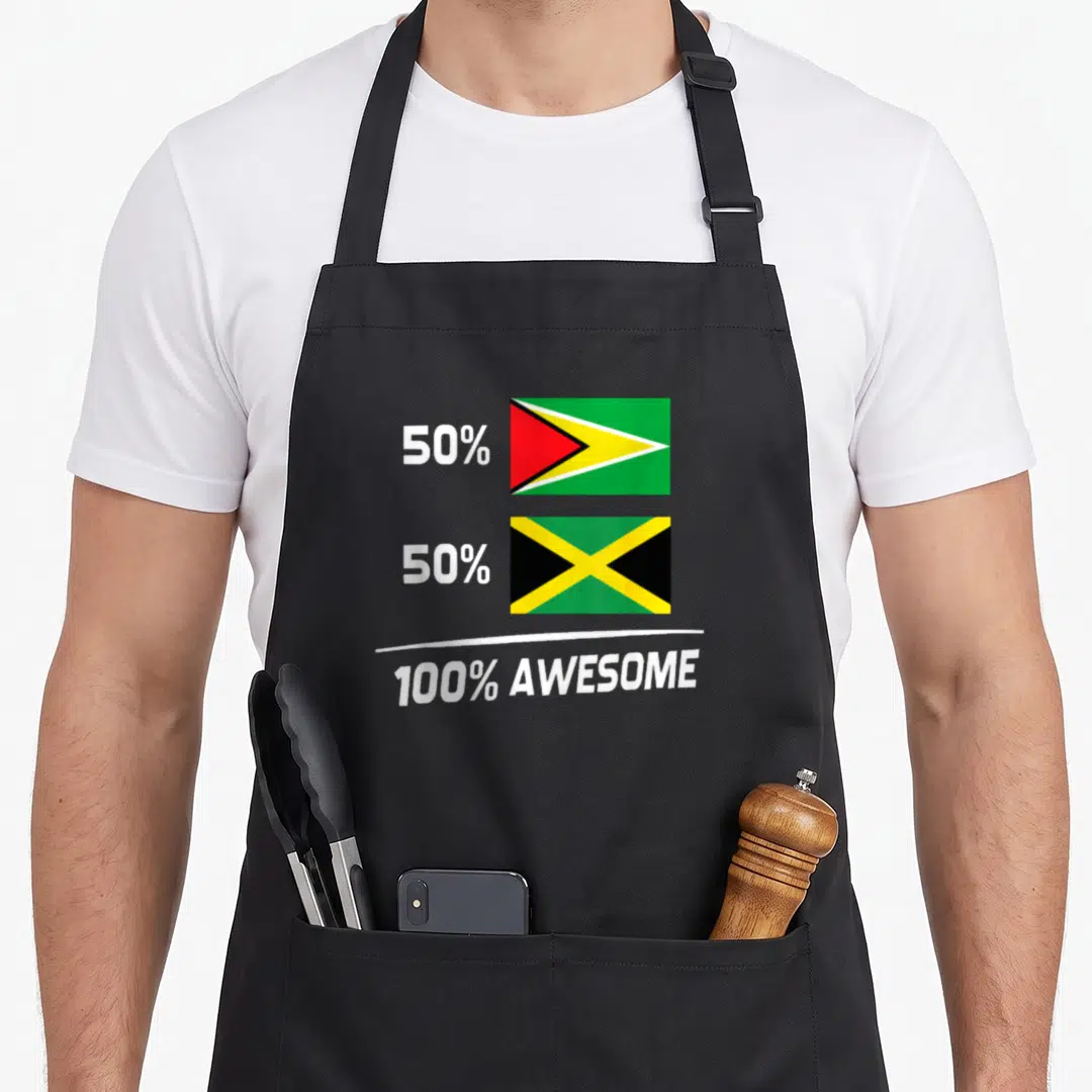 Jamaican guyana apron - Stacked Guyana and Jamaica flags with 50 percent 100 percent awesome text — shown on a black cotton canvas apron against a white background