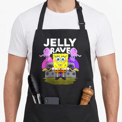 Jelly jam apron - SpongeBob SquarePants between two speakers with JELLY RAVE text and purple jellyfish — shown on a black cotton canvas apron against a white background