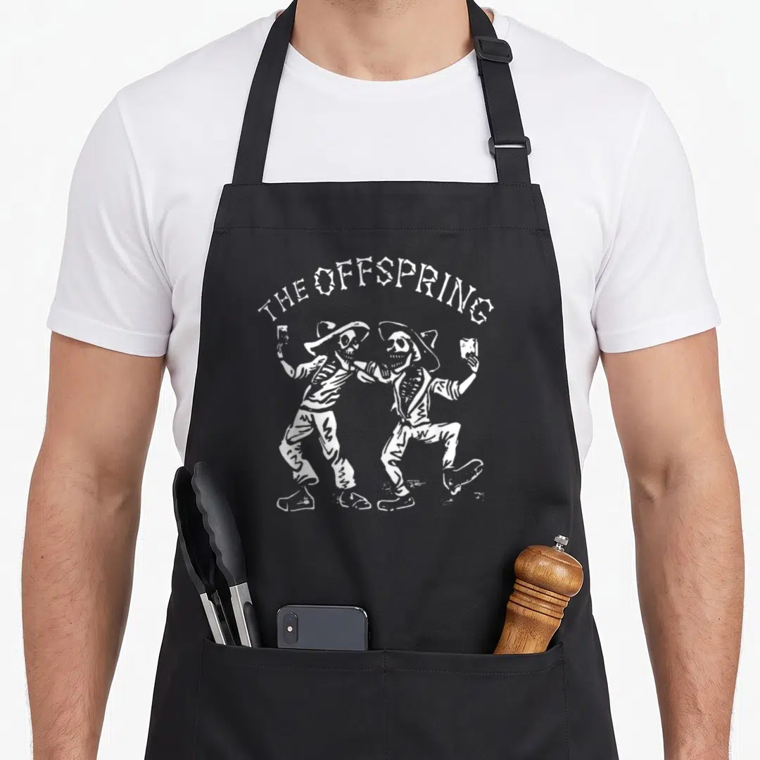 Offspring dance apron - White line-art of two dancing skeletons with hats and glasses under arched text — shown on a black cotton canvas apron against a white background