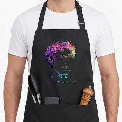 Bernie rainbow apron - Watercolor portrait of a man with glasses and text Vote for Bernard in rainbow colors — shown on a black cotton canvas apron against a white background
