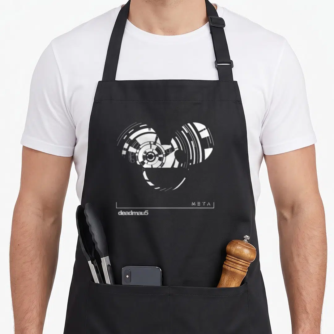Deadmau5 x apron - White geometric mouse head with concentric arcs and text META deadmau5 on grey background — shown on a black cotton canvas apron against a white background