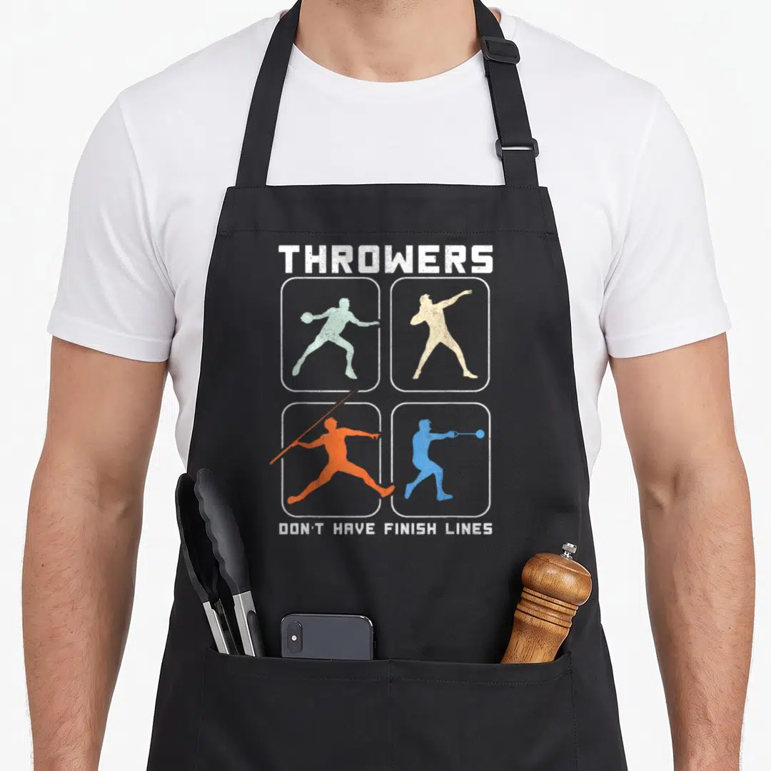 Line throwers apron - Four colored athlete silhouettes in white frames with distressed text — shown on a black cotton canvas apron against a white background