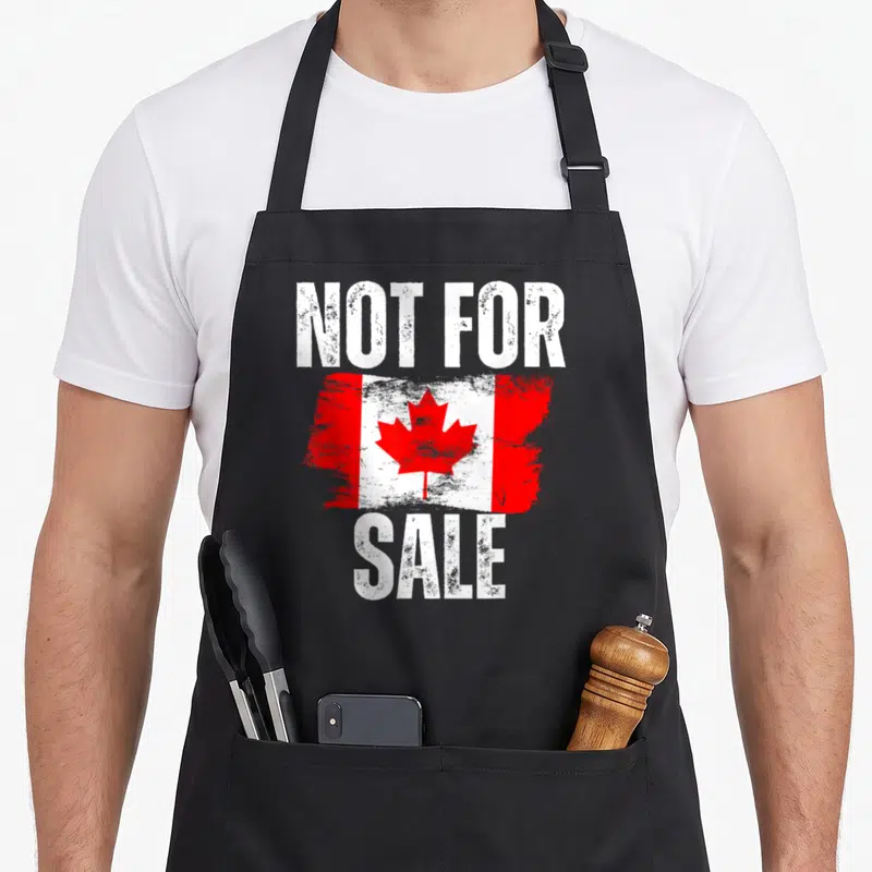 51st pride apron - Distressed Canadian flag with Not For Sale text in white block letters — shown on a black cotton canvas apron against a white background