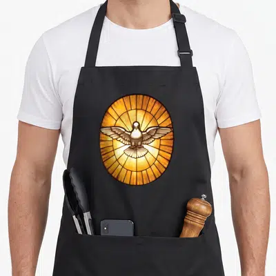 Dove catholic apron - Realistic dove in oval stained glass window with radiating lines in orange, yellow, white — shown on a black cotton canvas apron against a white background