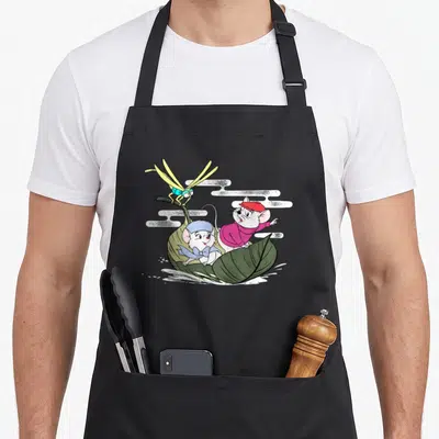 Rescuer mice looks apron - Two mice in green leaf boat with perched dragonfly and white clouds — shown on a black cotton canvas apron against a white background
