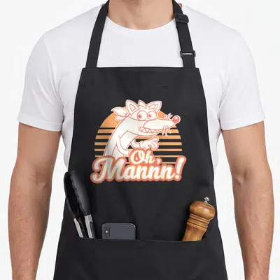 Dora stripe apron - Cartoon wolf with Oh Mannn text over orange striped sun — shown on a black cotton canvas apron against a white background