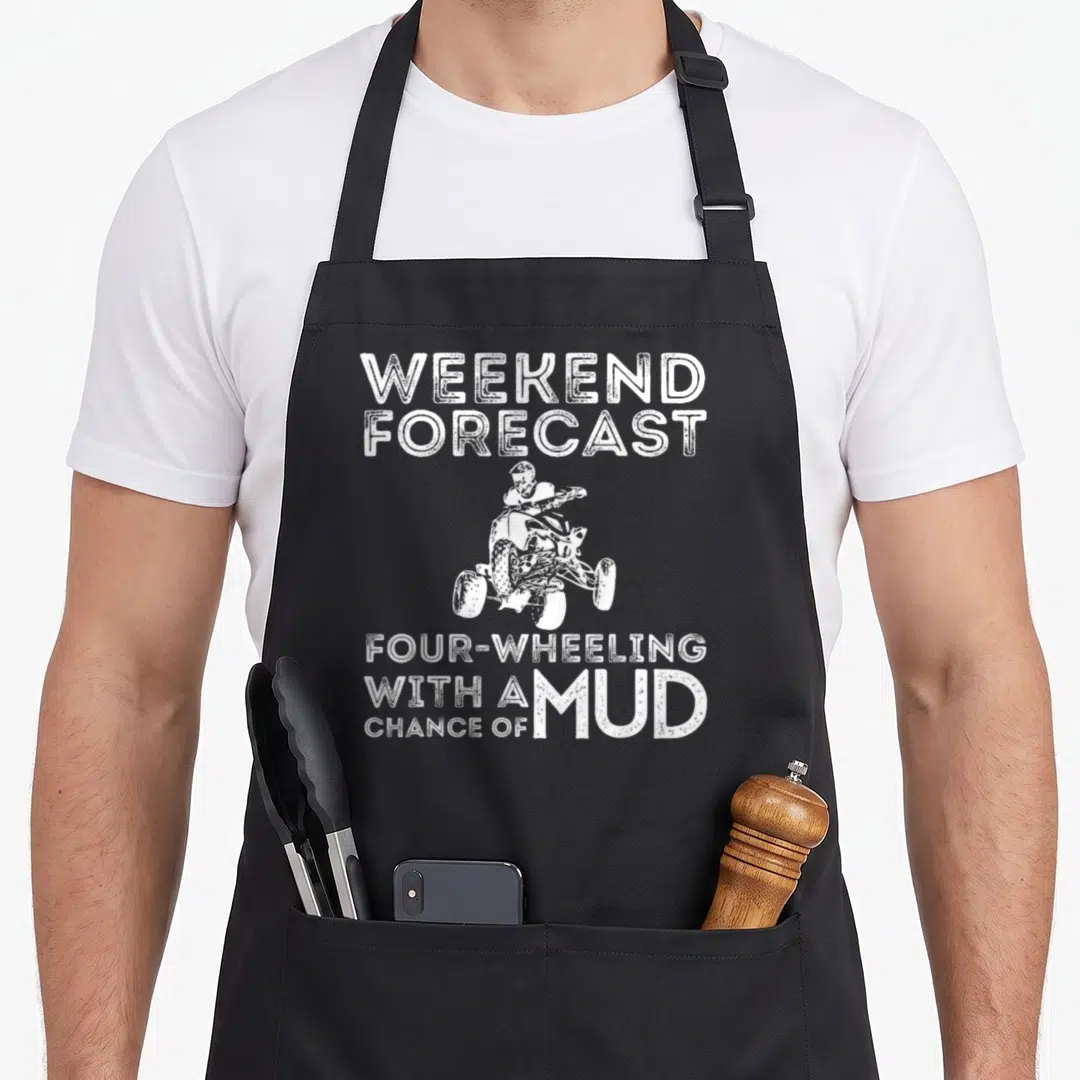 Forecast atv apron - White distressed text weekend forecast four wheeling chance of mud around ATV rider illustration — shown on a black cotton canvas apron against a white background