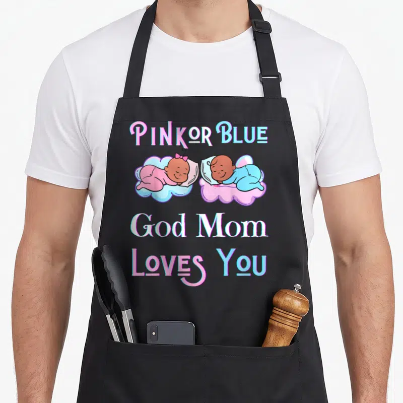 Blue god apron or apron - PINK OR BLUE text with two sleeping cartoon babies in pink and blue clouds — shown on a black cotton canvas apron against a white background