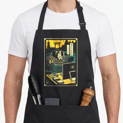 Samurai electronics apron - Cartoon samurai coding with Japanese text and C++ book on teal yellow background — shown on a black cotton canvas apron against a white background
