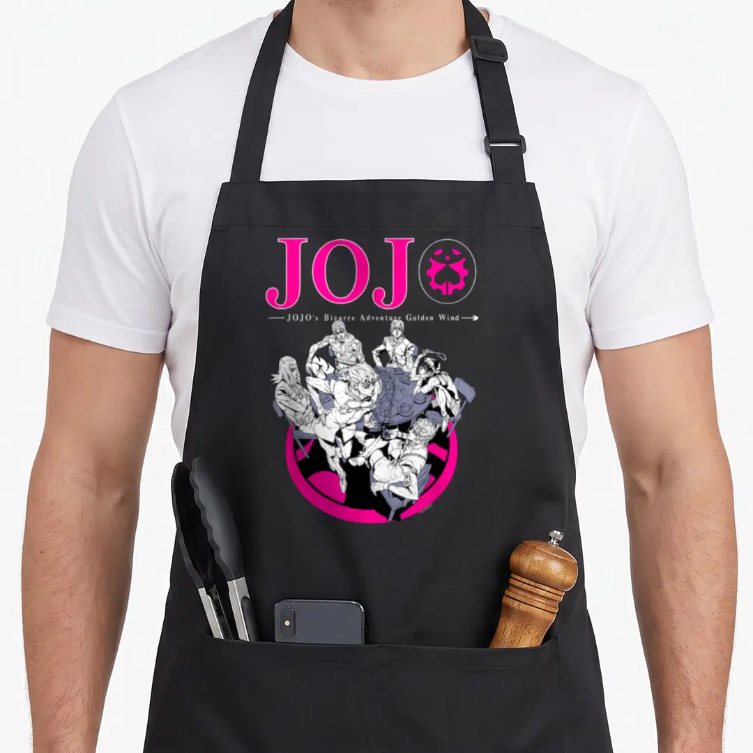 Part golden apron - Five men in line-art around a table below large pink JOJO text and emblem on pink circle background — shown on a black cotton canvas apron against a white background