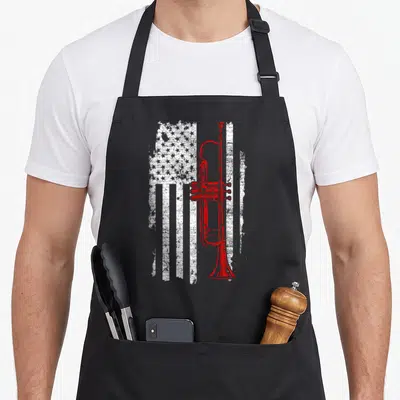 Jazz line apron - Red trumpet superimposed over distressed white USA flag pattern — shown on a black cotton canvas apron against a white background