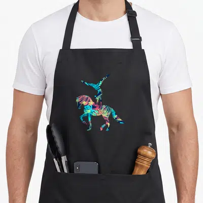 Vaulting horse apron - Cartoon acrobat balancing on horse in blue cyan green red brushstrokes — shown on a black cotton canvas apron against a white background