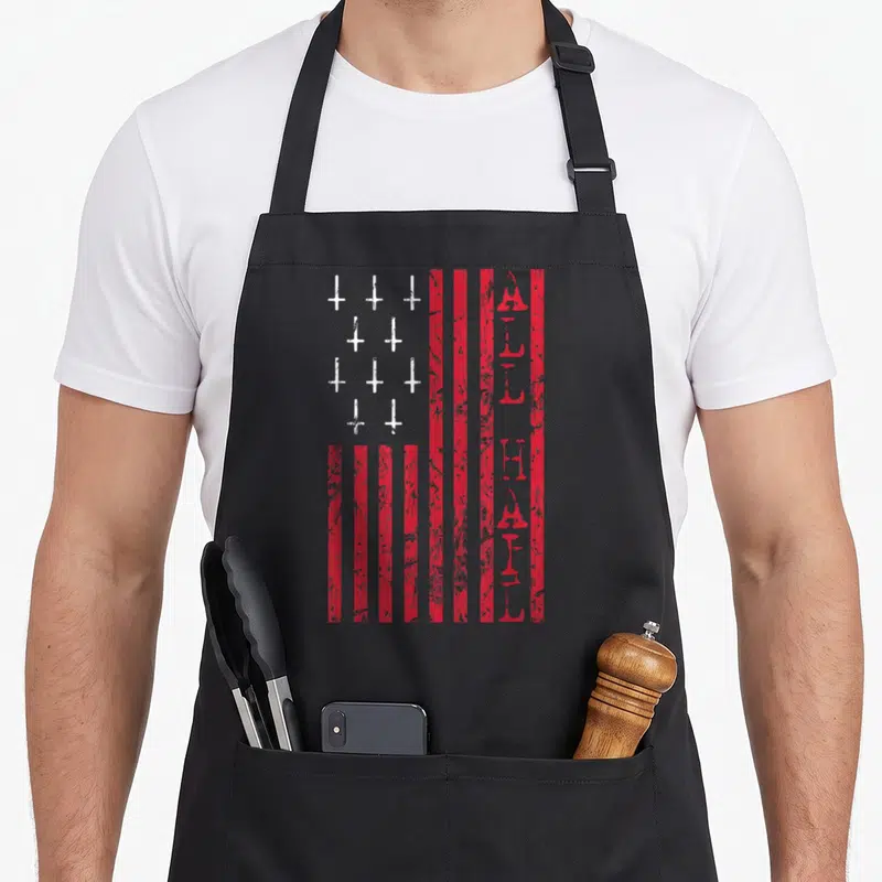 Upside cross apron - Red white striped flag with inverted crosses and vertical ALL HAIL text in distressed style — shown on a black cotton canvas apron against a white background