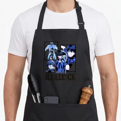 Lock split apron - Isagi Yoichi anime character in three blue black white panels with BLUE LOCK logo text — shown on a black cotton canvas apron against a white background