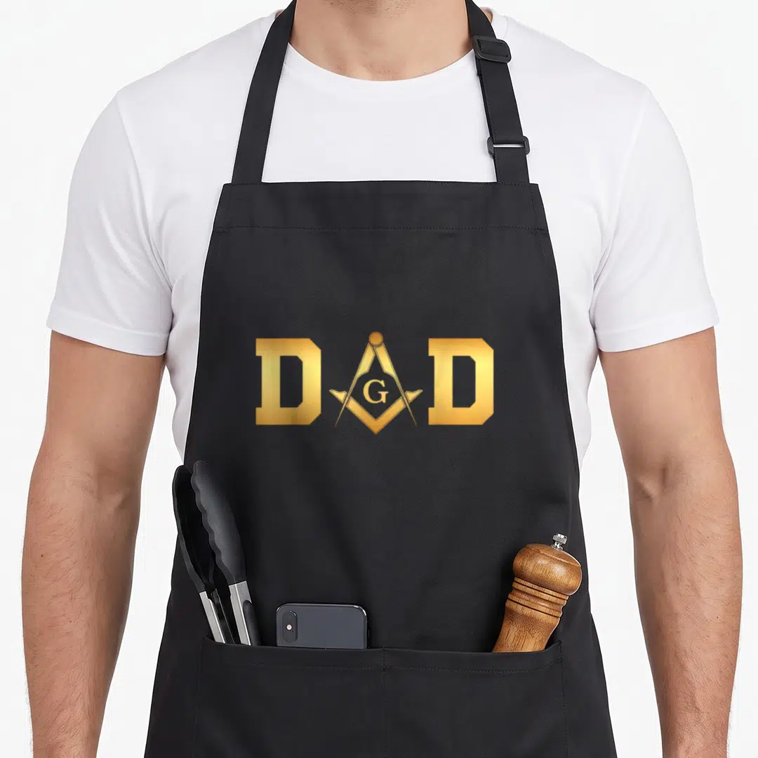 Freemason masonic apron - Gold DAD text with square and compass replacing the A and a G inside the symbol — shown on a black cotton canvas apron against a white background