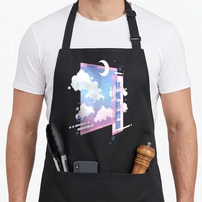 80s goth apron - Two overlapping digital windows with clouds, moon, and vertical blue text in pink and blue — shown on a black cotton canvas apron against a white background