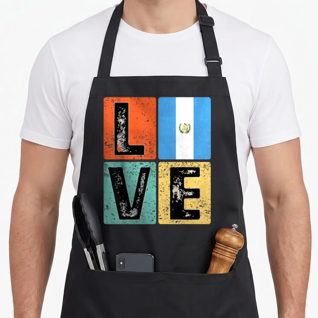 Guatemala flag pride guatemalan aprons - Distressed LOVE text with Guatemala flag replacing the O on orange, teal — shown on a black cotton canvas apron against a white background