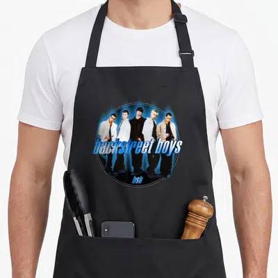 Circle novelty apron - Five men in blue circle with backstreet boys and bsb text — shown on a black cotton canvas apron against a white background