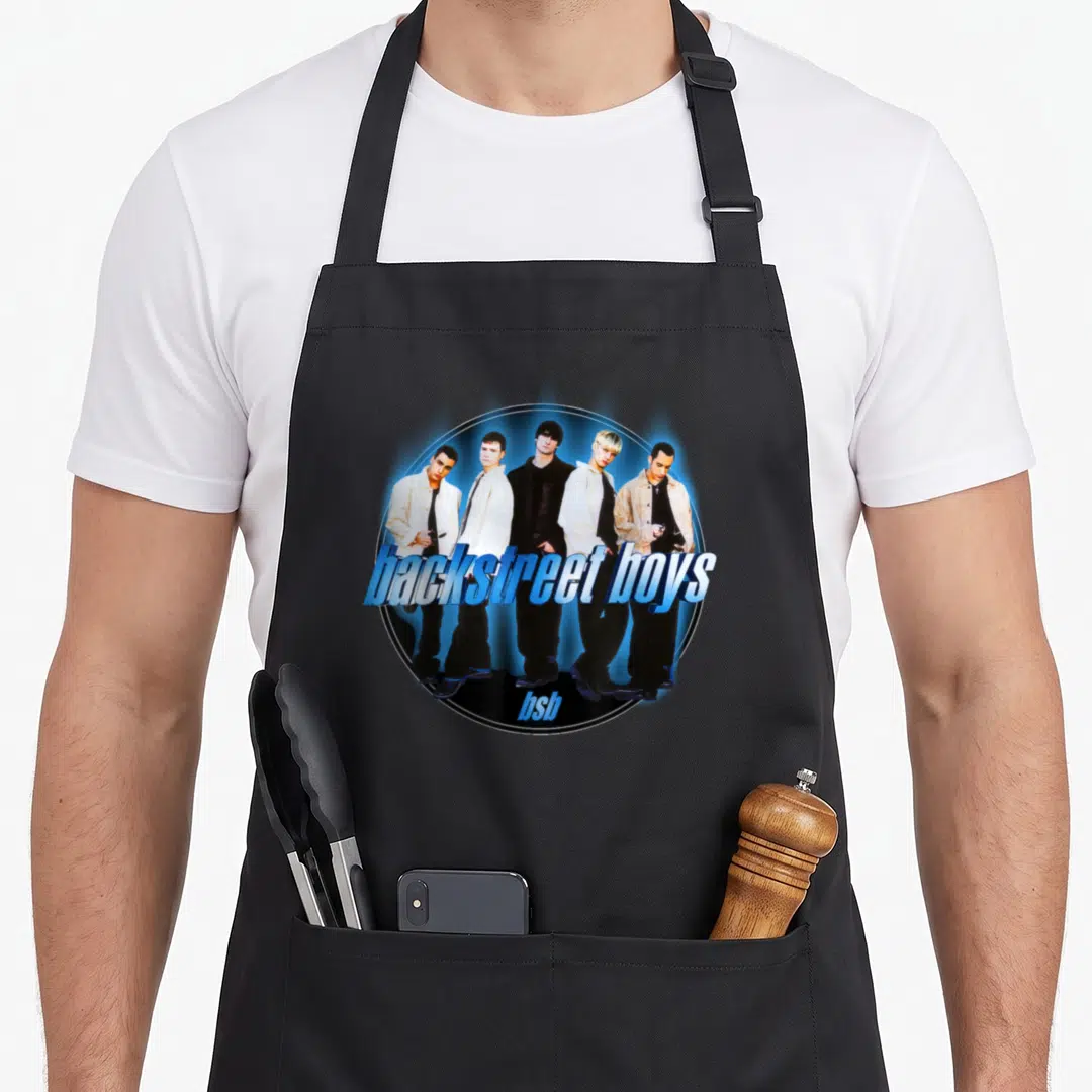 Circle novelty apron - Five men in blue circle with backstreet boys and bsb text — shown on a black cotton canvas apron against a white background