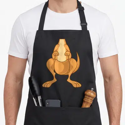 Costume kangaroo apron - Tan and brown cartoon dog merging with a bottle shape creating a kangaroo illusion — shown on a black cotton canvas apron against a white background