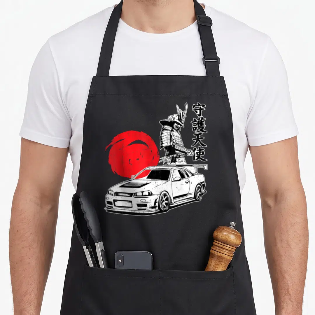 Car japan apron - White tuning car, samurai warrior, red sun circle, vertical black kanji characters — shown on a black cotton canvas apron against a white background