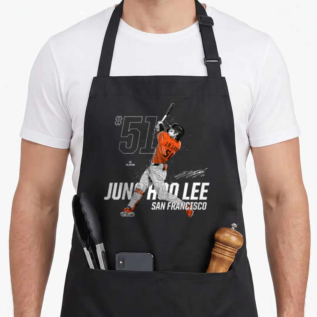 Dynamic san francisco apron - Jung Hoo Lee batting swing #51 San Francisco print in orange and grey — shown on a black cotton canvas apron against a white background