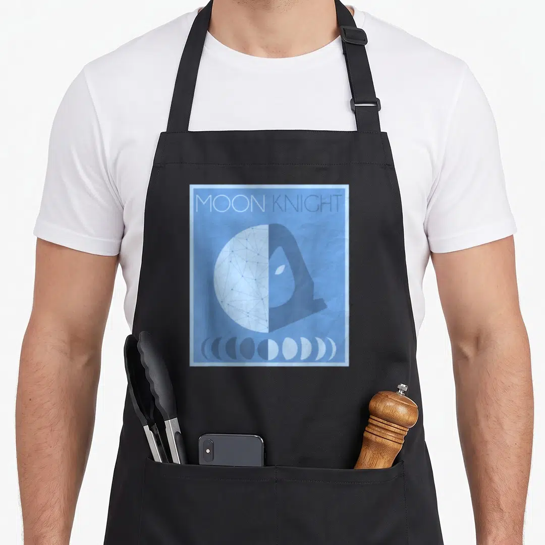Moon streetwear apron - Blue minimalist Moon Knight graphic with constellation moon, hooded head, and moon phase row — shown on a black cotton canvas apron against a white background