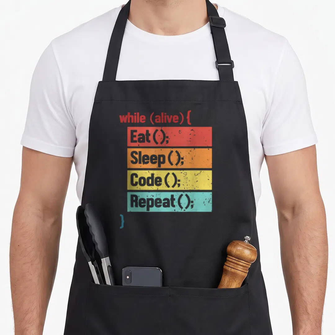 Code engineer apron - Stacked code syntax bars in red orange yellow teal with grey text on grey background — shown on a black cotton canvas apron against a white background