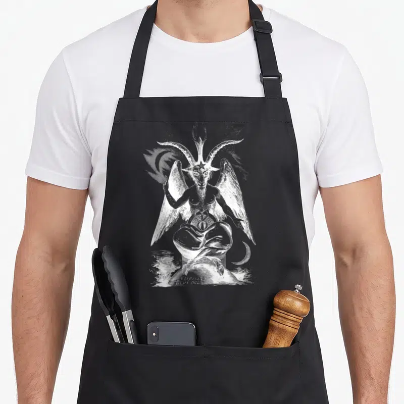 Sigil goat apron - White line art of Baphomet with flame, moon, and CLIPHAS LEVI DEL text on black fabric — shown on a black cotton canvas apron against a white background