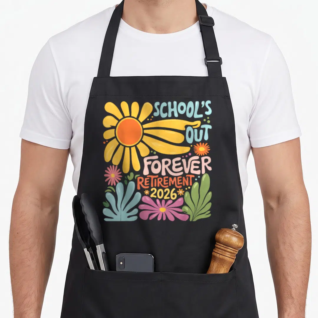 Summer teachers apron - SCHOOL'S OUT FOREVER RETIREMENT 2026 text with large yellow flower and colorful cartoon blooms — shown on a black cotton canvas apron against a white background