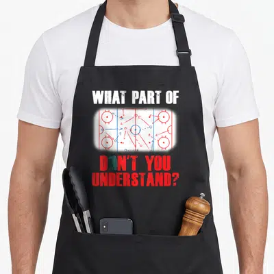 Player frappe apron - Hockey play diagram with puck and text WHAT PART OF DON'T YOU UNDERSTAND in red and white — shown on a black cotton canvas apron against a white background