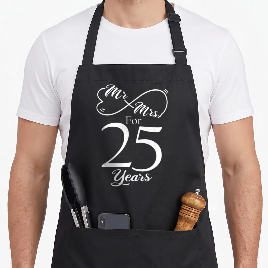 25th mr mrs aprons - White Mr & Mrs For 25 Years typography forming an infinity heart shape — shown on a black cotton canvas apron against a white background