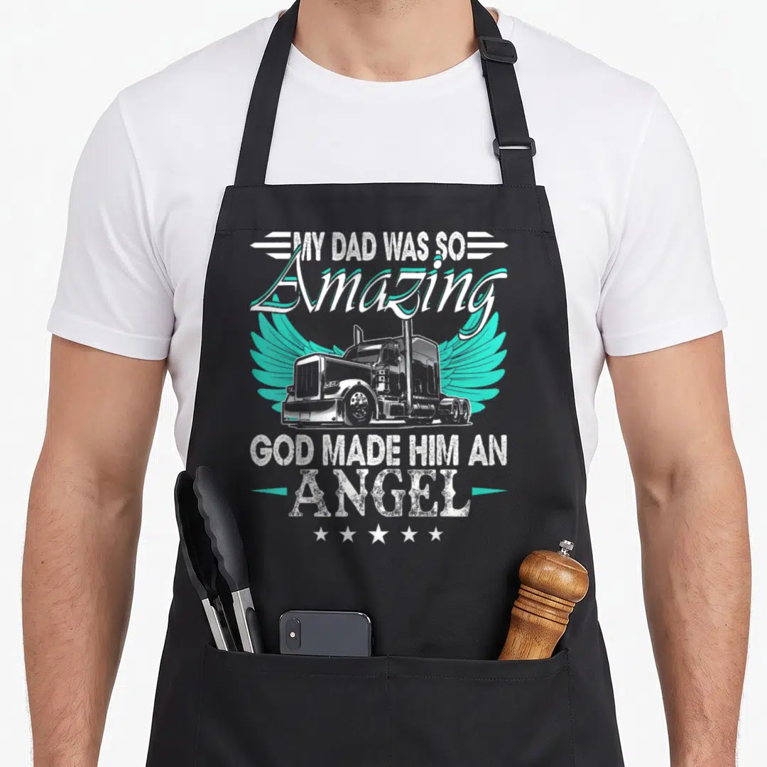 God truck apron - Semi truck with turquoise wings and text My Dad Was So Amazing God Made Him An Angel — shown on a black cotton canvas apron against a white background