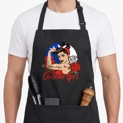 Chile chilean girl apron - Cartoon woman flexing arm with Unbreakable text, roses, and Chilean flag colors — shown on a black cotton canvas apron against a white background