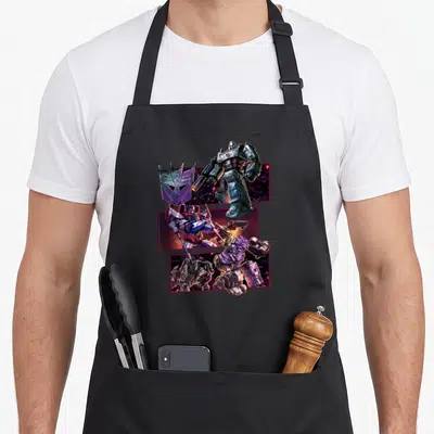 Panel transformer apron - Three Decepticons in stacked panels with purple logo overlap on black background — shown on a black cotton canvas apron against a white background