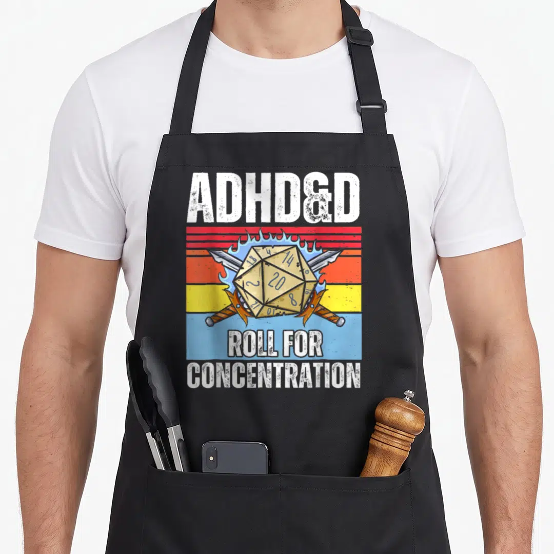 Concentration adhd apron - Retro twenty-sided die over crossed swords with blue flames on striped background — shown on a black cotton canvas apron against a white background