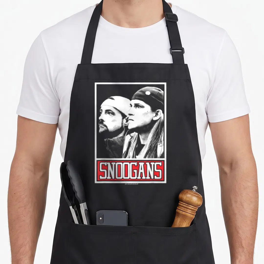 Clerk jay silent bob apron - Grey scale portrait of two men above red box with white text SNOOGANS — shown on a black cotton canvas apron against a white background