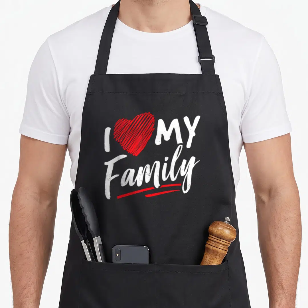 Family meeting gathering apron - I MY Family text with red heart and underlines — shown on a black cotton canvas apron against a white background